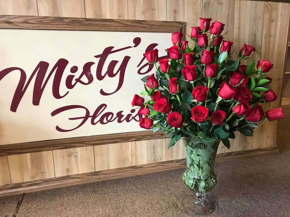 Classic Red Roses designed in an Urn always make a strong statement of beauty.